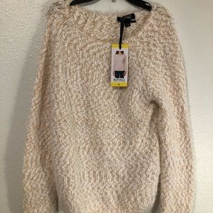 Oversized pink and white knitted sweater